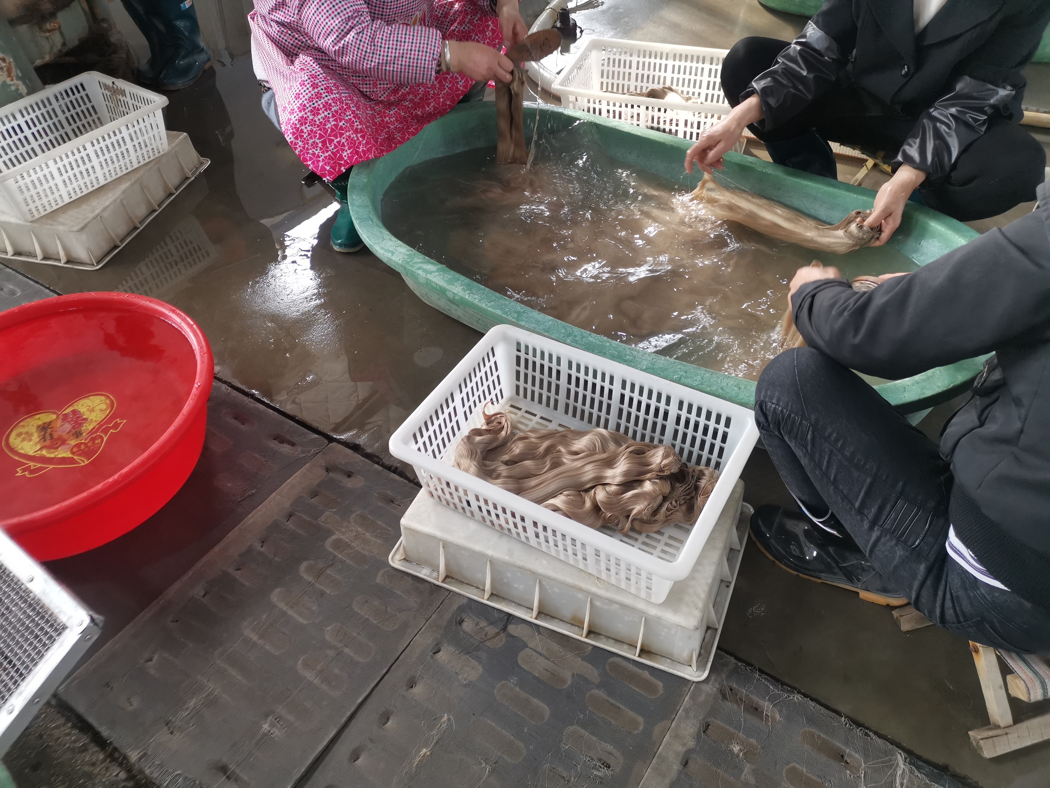 Workers washing and treating hair